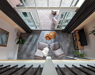 Uitzicht vanuit de woonkamer van Huisje in Tubbergen, vakantiehuis in Twente, Overijssel.