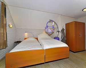 Comfortabele slaapkamer in Boshuus Zorg vakantiehuis, Deurningen, Twente met moderne voorzieningen.