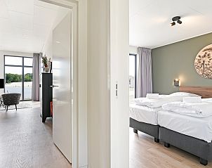 Slaapkamer met tweepersoonsbed in Sallandse Heuvelrug vakantiehuis 4L, Hoge Hexel, Twente.