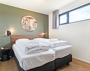 Comfortabele slaapkamer met terrasuitzicht in Sallandse Heuvelrug 4-persoons woning 4L, Hoge Hexel.