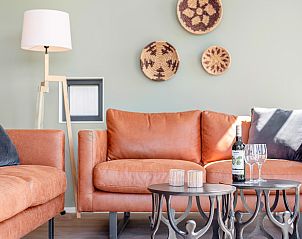 Slaapkamer met terrasuitzicht in Sallandse Heuvelrug 6-persoons woning, Hoge Hexel.