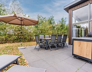 Gerumige Terrasse des 8-Personen-Hauses Sallandse Heuvelrug, Hoge Hexel, perfekt fr Mahlzeiten im Freien in Twente.