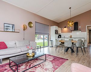 Zweites Schlafzimmer im Ferienhaus Sallandse Heuvelrug, Hoge Hexel, mit zwei Einzelbetten und warmer Atmosphre.