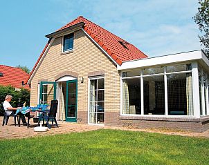Gezellige bungalow Vuurvlinder met Serre 10 in Hoge Hexel, Twente, met zonnig terras en groene omgeving in Overijssel.