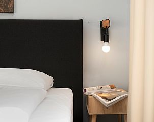 Tweede slaapkamer met uitzicht in Sallandse Heuvelrug 4-persoons woning 4B, Hoge Hexel, Overijssel.