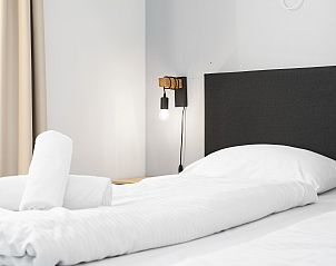 Schlafzimmer mit weichen Betten im Sallandse Heuvelrug 8-Personen-Bungalow in Hoge Hexel, Twente, Overijssel.