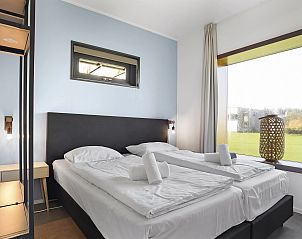 Badezimmer mit begehbarer Dusche im 8-Bett-Bungalow Sallandse Heuvelrug in Hoge Hexel, Twente, Overijssel.