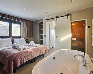 Verblijf 524626 - Vakantiewoning Twente - Happy Oak wellnesslodge met bubbeltub, ligbad, sauna en