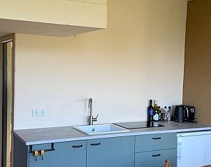 Moderne keuken in Vakantiehuisje in Wijhe, Salland, Overijssel. Geniet van comfort en stijl in deze gezellige vakantiewoning.