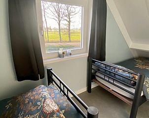 Comfortabele slaapkamer met eenpersoonsbedden in Vakantiehuisje in Raalte, Salland, Overijssel