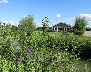 Vakantiehuis in Olst met uitzicht op een vijver en natuur, gelegen in Salland, Overijssel.