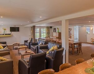 Comfortabele woonkamer in Huisje in Hellendoorn, vakantiehuis in Salland.