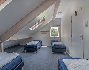 Sfeervolle slaapkamer in Huisje in Hellendoorn, vakantieaccommodatie in Overijssel.