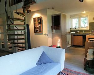 Open woonkamer van Vakantiehuisje in Wesepe, modern comfort in Salland, Overijssel.