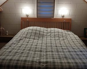 Comfortabele slaapkamer in Vakantiehuisje in Wesepe, rustgevende sfeer in Salland, Overijssel.