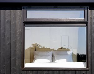 Buitenaanzicht van Vakantiehuis in Wesepe met grote ramen, Salland, Overijssel