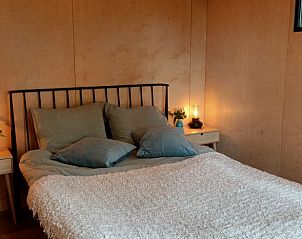 Schnes Schlafzimmer im Ferienhaus in Lettele, Salland, Overijssel mit Doppelbett.