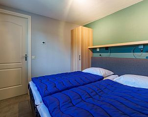 Comfortabele slaapkamer met tweepersoonsbed in vakantiehuis Reggezicht, Marle, Salland, Overijssel.