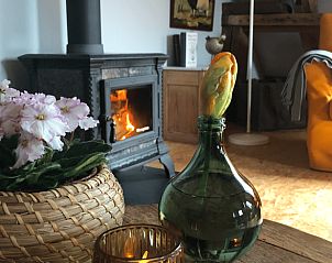 Cozy living room in Cottage in Ommen, cottage in the Vecht region Overijssel with wood stove and cozy furnishings.