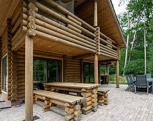 Spacious veranda of Holiday home in Ommen, ideal for outdoor dining in the Vecht region, Overijssel.