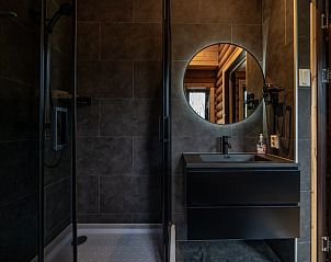 Modern bathroom with mirror in Holiday home in Ommen, located in the Vecht region, Overijssel.