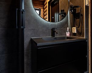 Luxury sink with mirror in Holiday home in Ommen, a stylish vacation home in the Vecht region, Overijssel.
