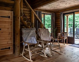 Cozy sitting area with rocking chairs in Holiday home in Ommen, a cozy stay in the Vecht region, Overijssel.