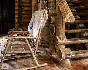 Wooden rocking chair in Holiday home in Ommen, a rustic residence in the Vecht region, Overijssel.