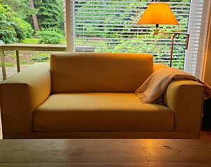 Gemtlicher Kamin im Ferienhaus in Dalfsen, warme Atmosphre in der Region Vecht, Overijssel.