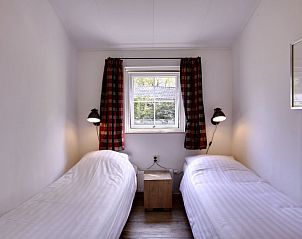 Buitenzijde van Vakantiehuis 4-persoons bos in Dalfsen, omringd door natuur en rust in de Vechtstreek, Overijssel.