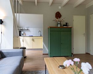 Gezellige zithoek in Vakantiehuis Buitenplaats Gerner in Dalfsen, ideaal voor familiebijeenkomsten.