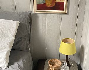 Artful details in the bedroom of Huisje in Dalfsen, vacation home in Overijssel.