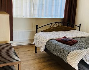 Tweede slaapkamer in Huisje in Balkbrug, vakantiehuis in Vechtstreek, Overijssel, met rustieke inrichting en comfort.