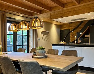 Cozy indoor cottage in Giethmen, Overijssel with wooden interior and modern kitchen in the Vecht region.