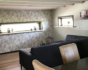 Gezellige woonkamer in Vakantiehuisje in Vinkenbuurt, Vechtstreek, Overijssel.