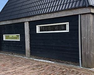 Bakstenen terras bij Vakantiehuisje in Vinkenbuurt, Vechtstreek, Overijssel.