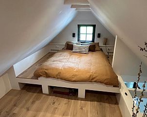 Sfeervolle slaapkamer in vakantiehuisje in Giethoorn, Overijssel.