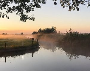 Adembenemende zonsopgang bij vakantiehuisje in Giethoorn, Overijssel.