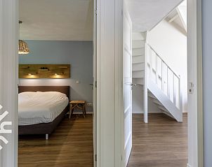 Gemtliche Sitzecke im Ferienhaus OV072, Giethoorn, mit bequemen Sofas.