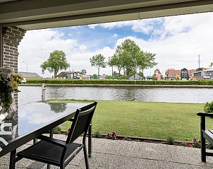 berdachte Terrasse des Ferienhauses OV007, Giethoorn, Nordwest Overijssel, Overijssel.