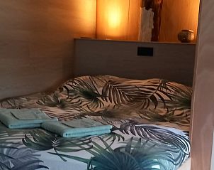 Sfeervolle slaapkamer in Vakantiehuisje in Scheerwolde, Overijssel.