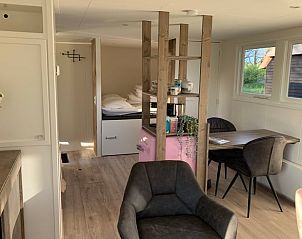 Comfortabele leefruimte in Vakantiehuis in Kalenberg, met uitzicht op de natuur.