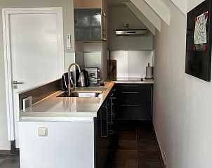 Compacte keuken in Vakantiehuisje in Tuk, ideaal voor zelfvoorzienende vakanties in Noordwest Overijssel.