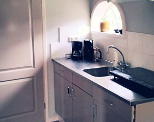 Gezellige zithoek in Huisje in Eesveen, ontspannende binnenruimte in Overijssel.