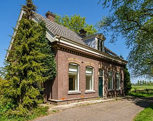 Charmant Vakantiehuisje in Abcoude, Utrecht omringd door groene natuur en rustieke charme, ideaal voor een ontspannen verblijf in Nederland.