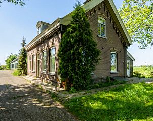 Charmant Vakantiehuisje in Abcoude, Utrecht, omgeven door groene natuur en rustieke charme van een historisch pand.