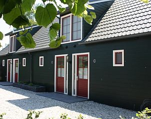 Achterzijde van Huisje in Abcoude, vakantiehuis in Utrecht noord, met groene omgeving.
