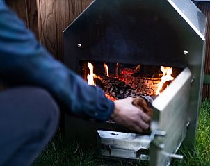 Houtkachel voor warmte in Vakantiehuis in Vinkeveen, Utrecht noord.