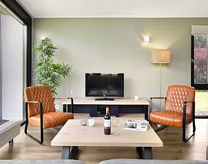 Gezellige zithoek in vakantiehuis Amerongse Berg, Utrechtse Heuvelrug.