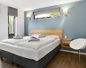 Stijlvolle slaapkamer in de Amerongse Berg 4-persoons woning, gelegen op de Utrechtse Heuvelrug, Overberg.